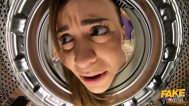 A cute girl got stuck in a washing machine, and her neighbor took advantage of the moment while she was in a revealing pose.